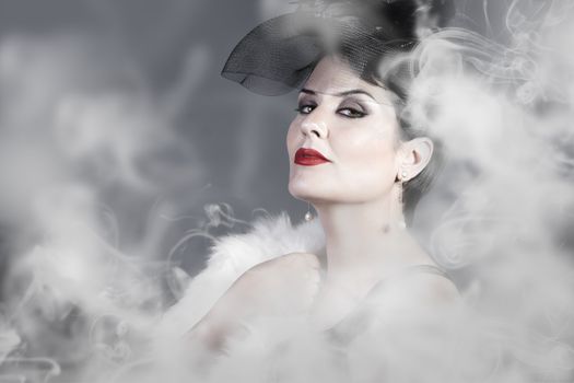 Sensual widow over smoke background