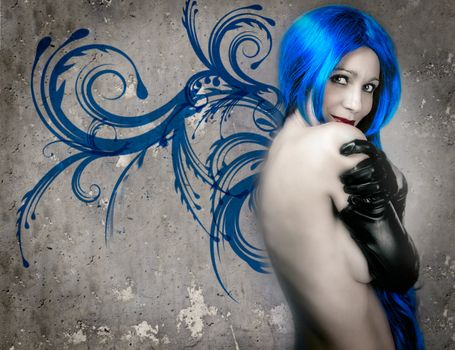 Young woman with blue hair over fantasy background