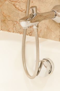 Faucet with two handles and white bath