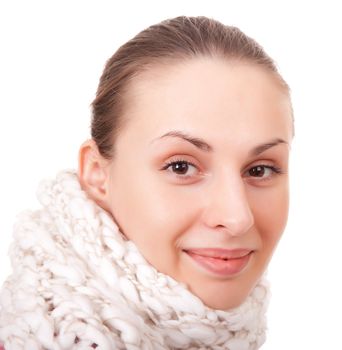 Beautiful young woman in winter scarf on white background