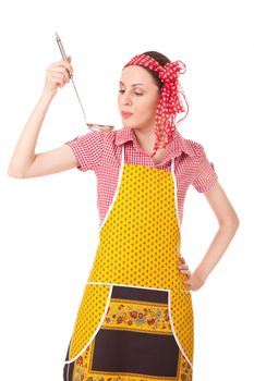 Woman with ladle is tasting a dish, isolated on white background