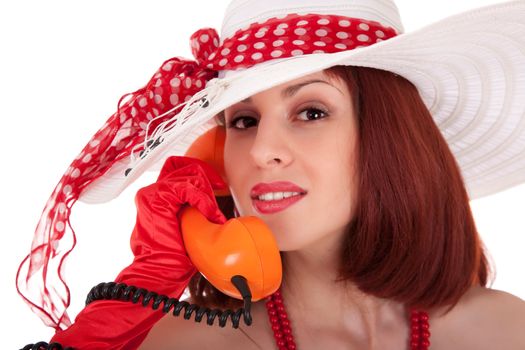 Fashion girl in retro style with vintage phone on white background