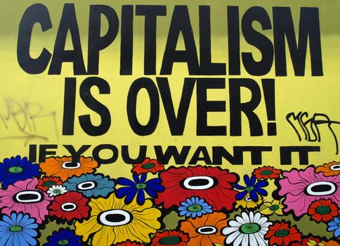 "Capitalism is over! If you want it" text on a graffiti
