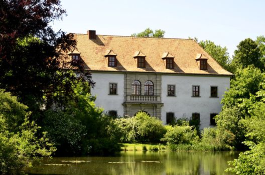 This photo present Bad Muskau old castle in the park.