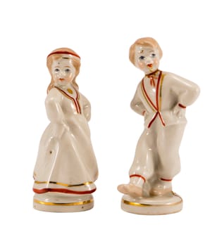 two ceramic toy decor dancers statue boy and girl isolated on white background