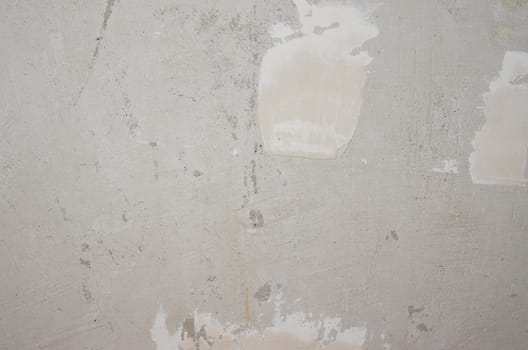 Concrete wall covered with putty as natural background