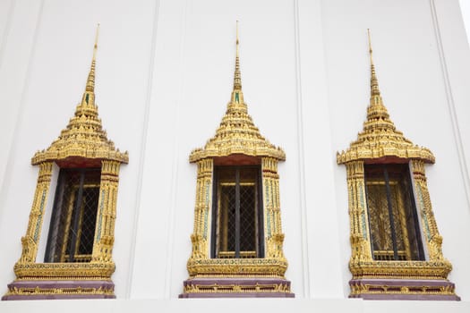 thai style temple window at wat phra kaew, bangkok, thailand