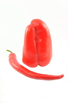 Sweet and sharp peppers on the isolated white background