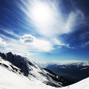 top of mountains in blue sky