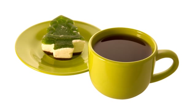 cup of tea and cake in the form of a Christmas tree (isolated object)