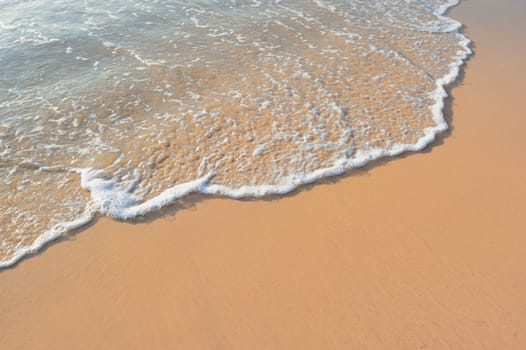 Soft wave of the sea on the sandy beach