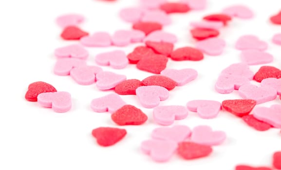 Pink andc red hearts - decorations for cakes, isolated on white background.