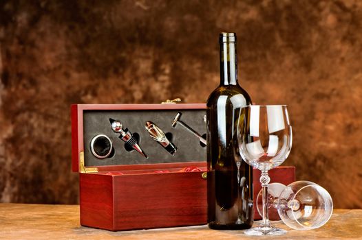 Composition of wine bottle and two wine glasses