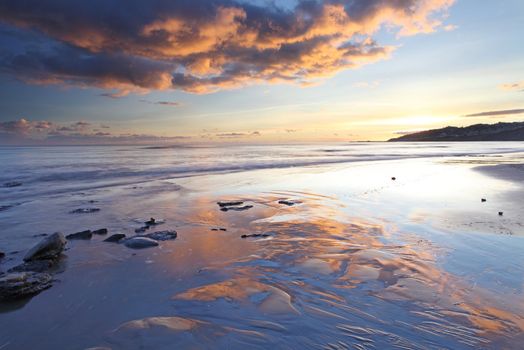 Charmouth beach at sunset looking toward lyme regis