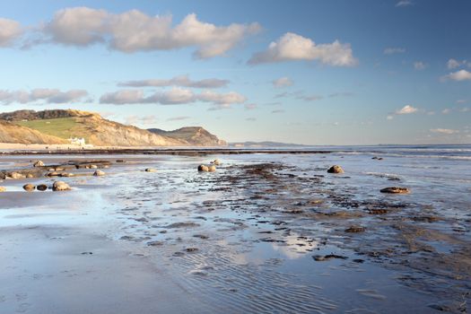 Charmouth beach at sunset looking toward west bay