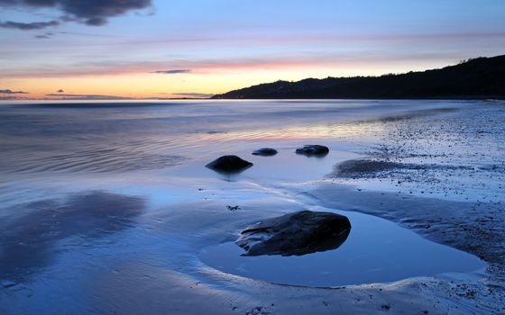 Charmouth beach at sunset looking toward lyme regis