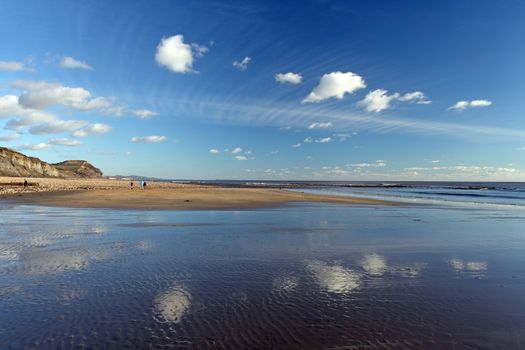 Charmouth beach at sunset looking toward west bay