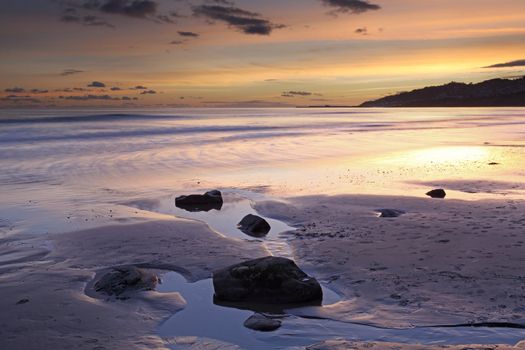 Charmouth beach at sunset looking toward lyme regis