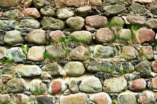 Backdrop of retro castle stone wall and grass grow.