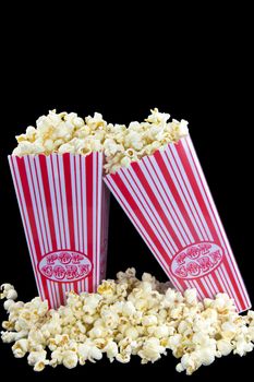 Picture of two popcorn baskets where one of them is hanging on the other