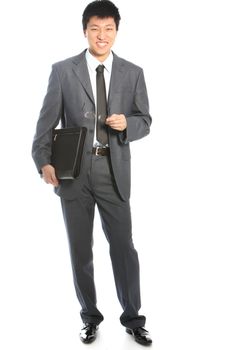 Studio shot of friendly aian businessman on white background