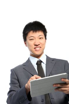 Happy businessman touching a PC tablet, portrait