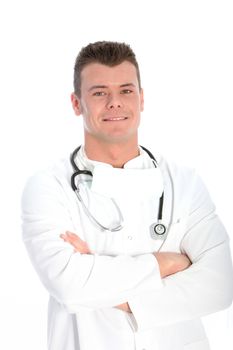 Confident male doctor standing with his arms folded looking at the camera with a friendly smile isolated on white
