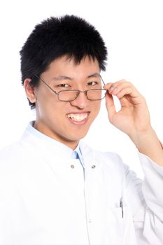 Smiling good-looking young Asian man wearing glasses lowering the frames and peering over the top at the camera, upper body studio portrait isolated on white