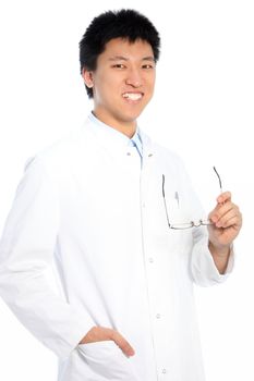 Smiling Asian young doctor holding his eyeglasses, portrait