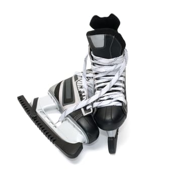 Two hockey skates on a white background.