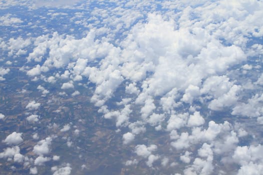 Aerial view of peaceful earth covered in clouds