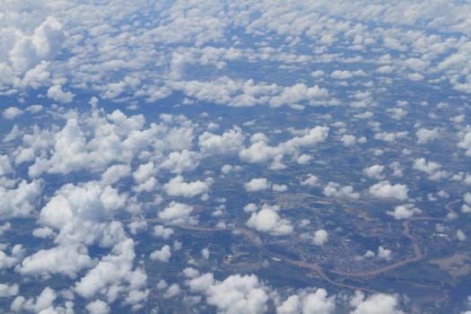 Aerial view of peaceful earth covered in clouds