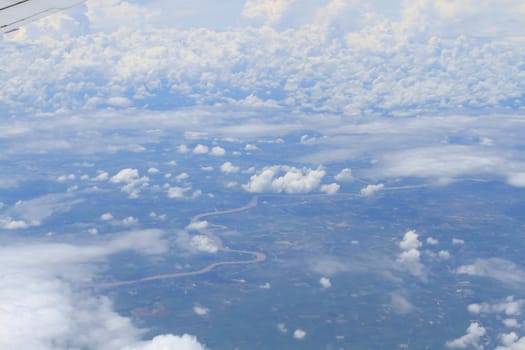 Aerial view of peaceful earth covered in clouds