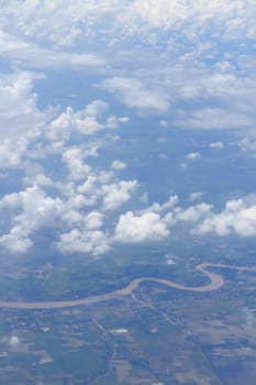 Aerial view of peaceful earth covered in clouds