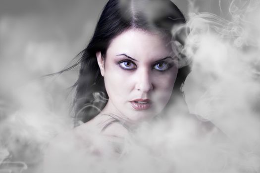 Sensual widow over smoke background