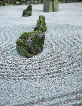 Zen Garden on Dark day with moss covered rocks