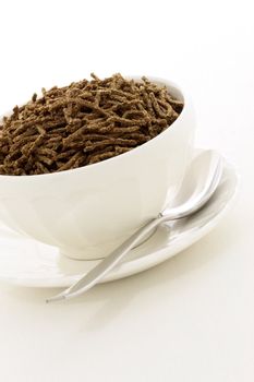 Delicious and nutritious cereal, high in bran, high in fiber, served in a beautiful  French Cafe au Lait Bowl with wide rims. In place of handles. This healthy bran cereal will be an aid to digestive health. 