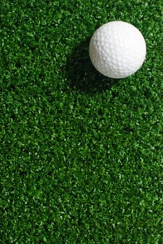 Golf ball on green grass