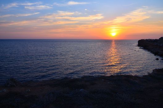 Sunset over the sea and sky in summer