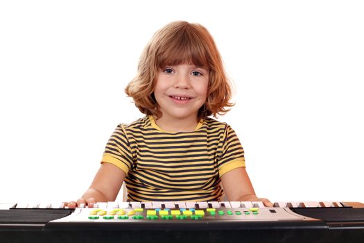 happy little girl play music on keyboard