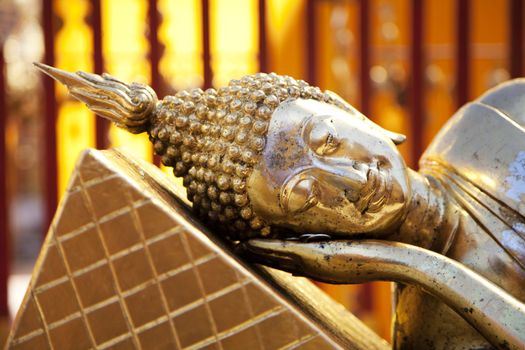Lying Golden Buddha at Doi Suthep temple in Chiang Mai province in Thailand