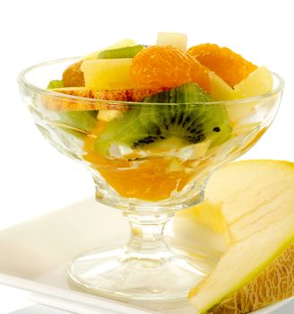 fresh fruit cocktail with apple kiwi in glass