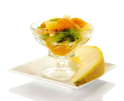 fresh fruit cocktail with apple kiwi in glass
