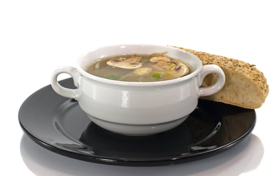 mushroom soup with piece of bread