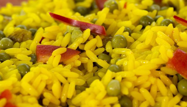 diner dish with yellow rice and red peppers