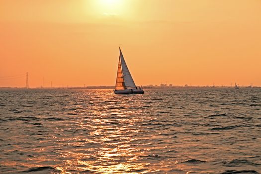 Sailing at sunset on the IJsselmeer in the Netherlands