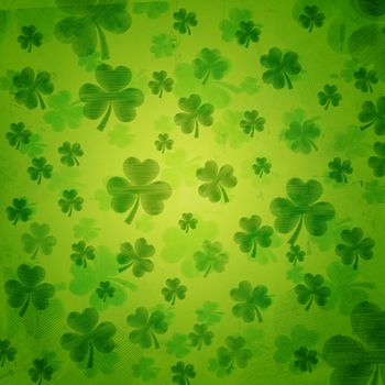 shamrocks - vintage green background with striped flowers over old paper