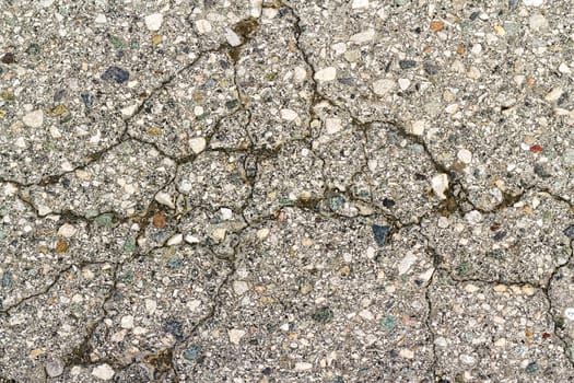 old asphalt texture with cracks as a background