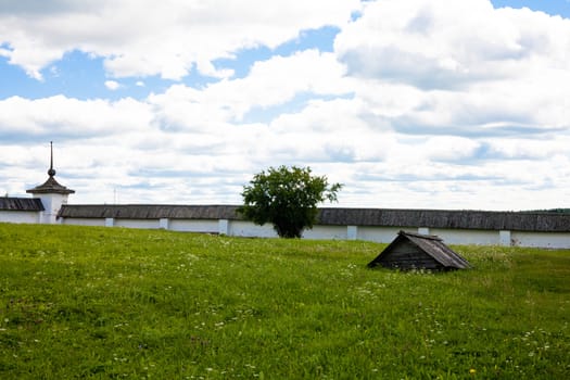 Inner yard in Ferapontov monastery in summer day

