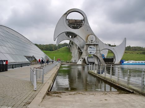 FALKIRK - OCTOBER 18:View of the Falkirk Wheel on October 18, 2010 in Falkirk, Scotland. The Falkirk Wheel is a rotating boat lift located in Scotland, UK, connecting the Forth and Clyde Canal with the Union Canal, opened in 2002.